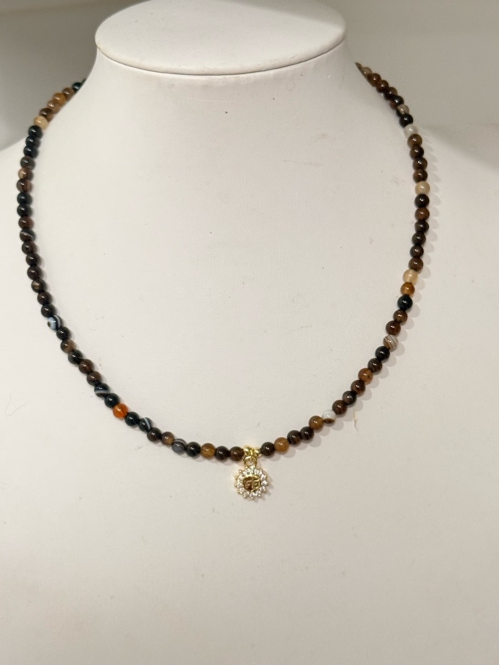 Tiger Eye Gem Necklace with Gold Sun Pendant with Fe Charm